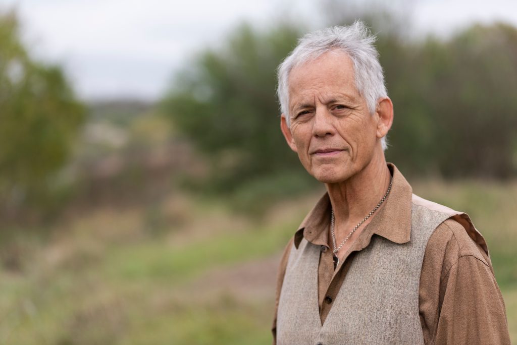 Rudi Harst outdoors in a quiet portrait