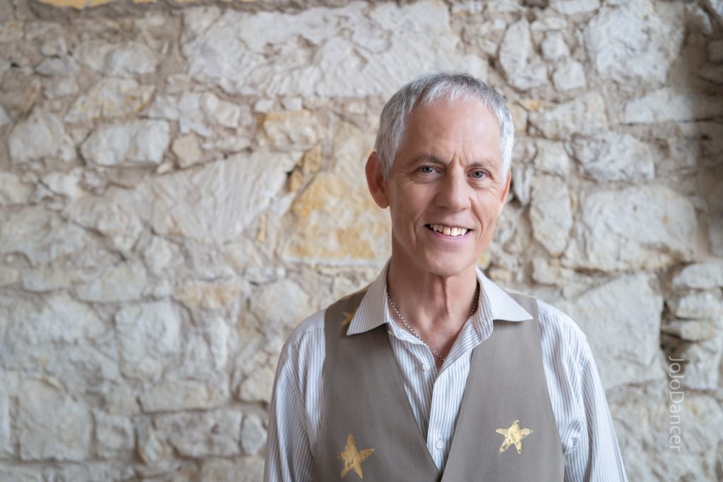 Rudi Harst in a stone-walled portrait setting
