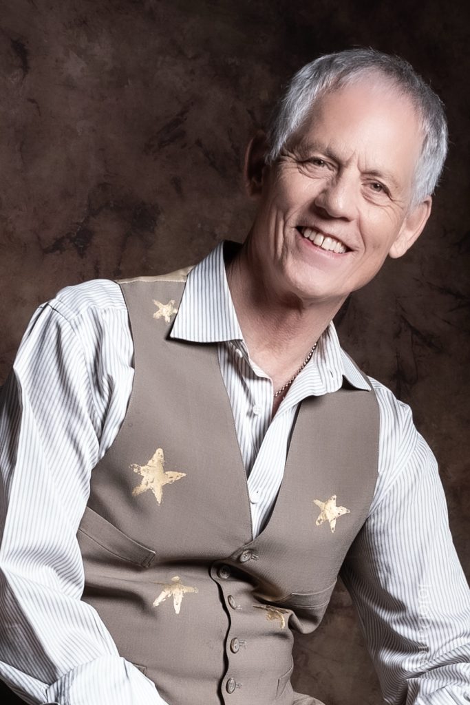 Rudi Harst in a contemplative studio portrait