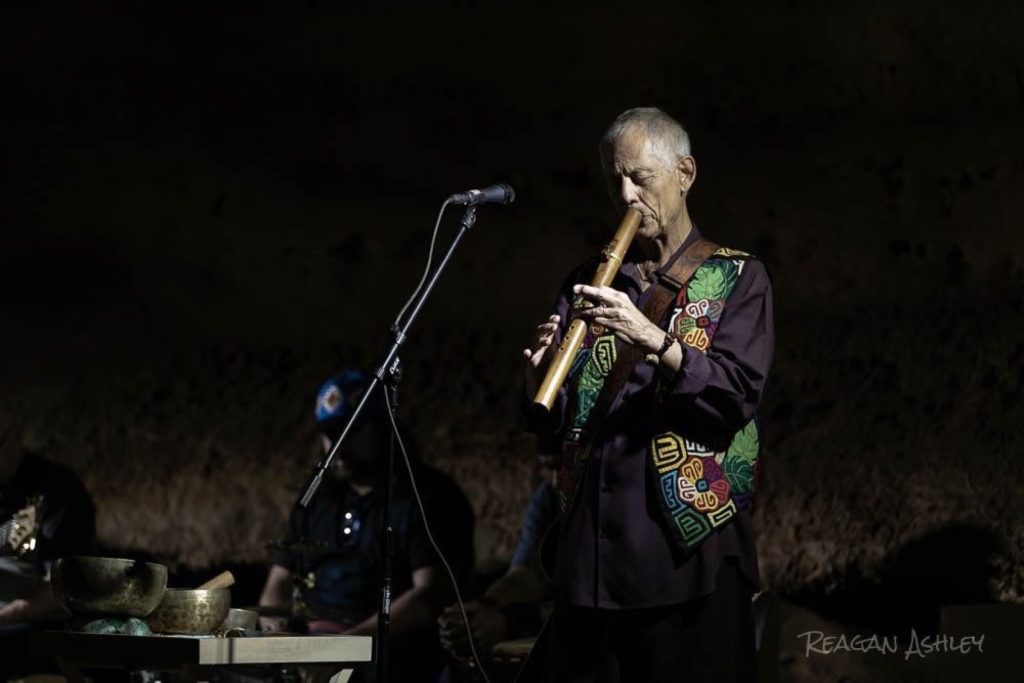Rudi Harst playing flute in an intimate performance
